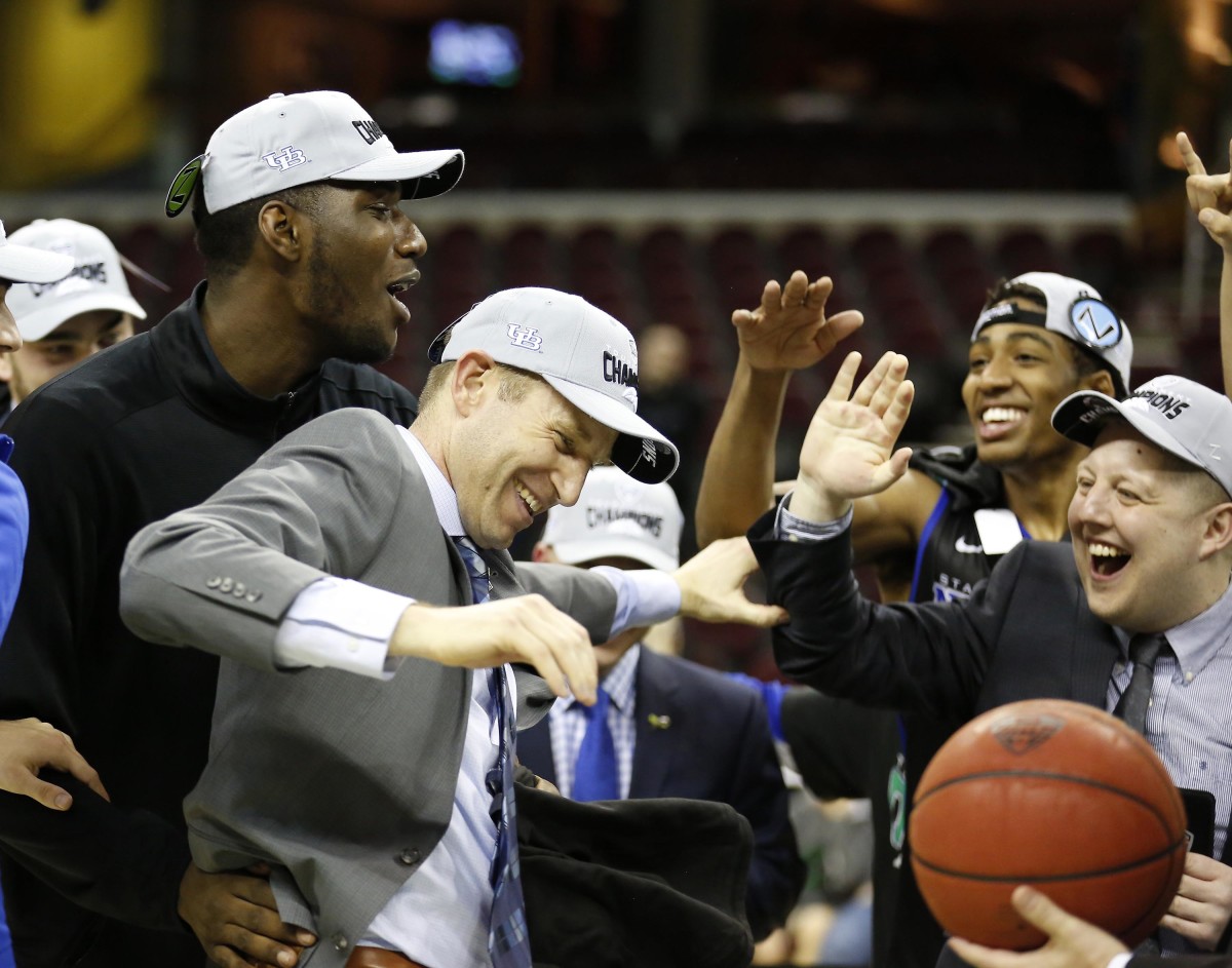 Buffalo Bulls head coach Nate Oats celebrates as his team takes the MAC conference tournament championship versus the Akron Zips at Quicken Loans Arena.