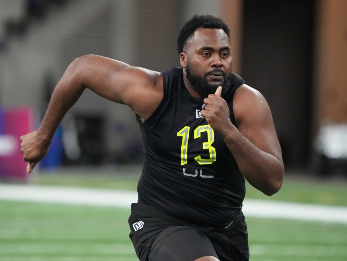 Mar 4, 2022; Indianapolis, IN, USA; Texas Christian offensive lineman Obinna Eze (OL13) goes through drills during the 2022 NFL Scouting Combine at Lucas Oil Stadium. Mandatory Credit: Kirby Lee-USA TODAY Sports