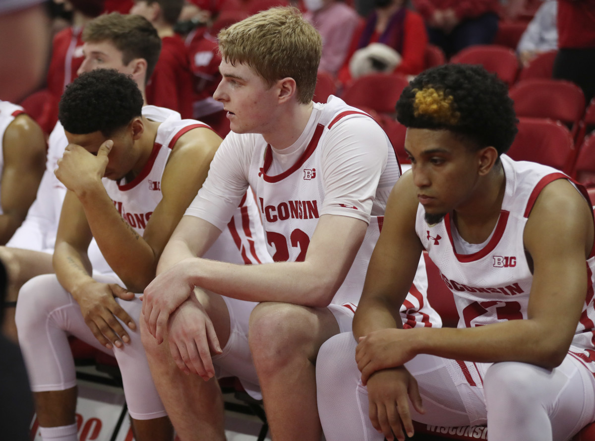 Jordan Davis (left), Steven Crowl (middle), and Chucky Hepburn (right) look on as the Badgers fall to Nebraska.