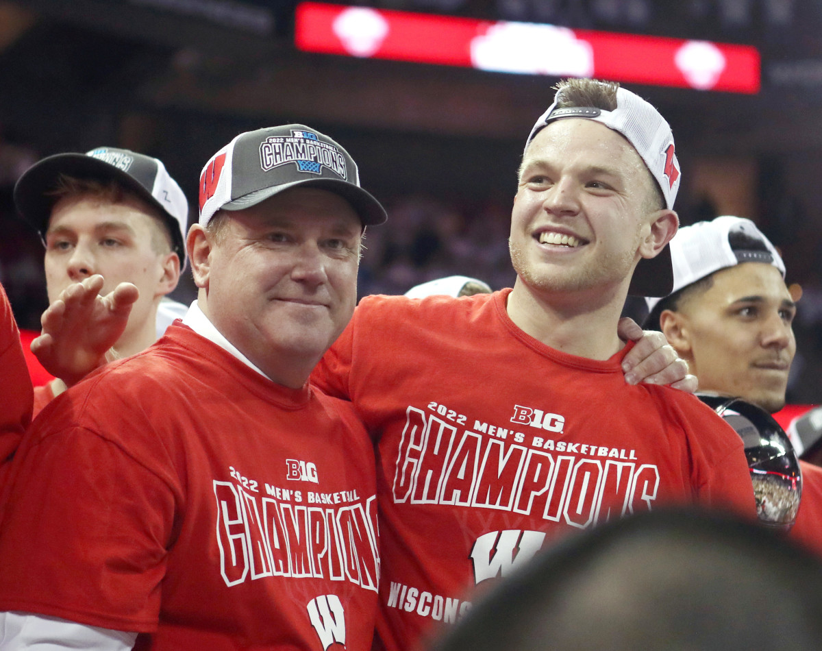 Greg Gard and Brad Davison celebrating a Big Ten Championship.