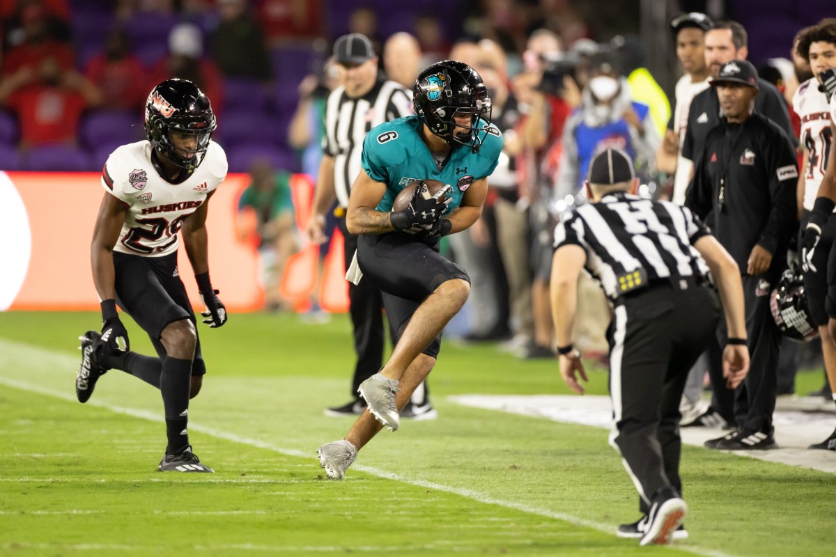 Dec 17, 2021; Orlando, Florida, USA; Coastal Carolina Chanticleers wide receiver Jaivon Heiligh (6) catches a pass during the first half against the Northern Illinois Huskies during the 2021 Cure Bowl at Exploria Stadium. Mandatory Credit: Matt Pendleton-USA TODAY Sports