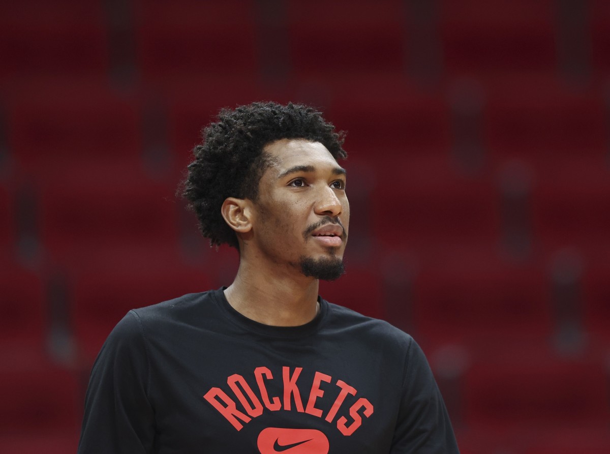 Houston Rockets guard Armoni Brooks (7) warms up before the game against the Golden State Warriors at Toyota Center