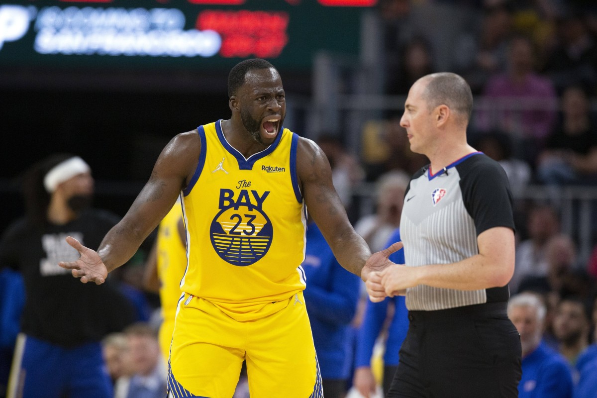 Mar 20, 2022; San Francisco, California, USA; Golden State Warriors forward Draymond Green (23) has words with referee Marat Kogut after he was assessed a second technical foul and ejected from the game during the third quarter against the San Antonio Spurs at Chase Center. Mandatory Credit: D. Ross Cameron-USA TODAY Sports