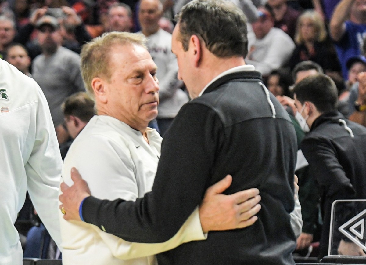 Duke coach Mike Krzyzewski (right) hugs Michigan State coach Tom Izzo after a 85-76 win for the Blue Devils in Greenville, S.C.on Sunday. (Ken Ruinard/USA TODAY Sports)