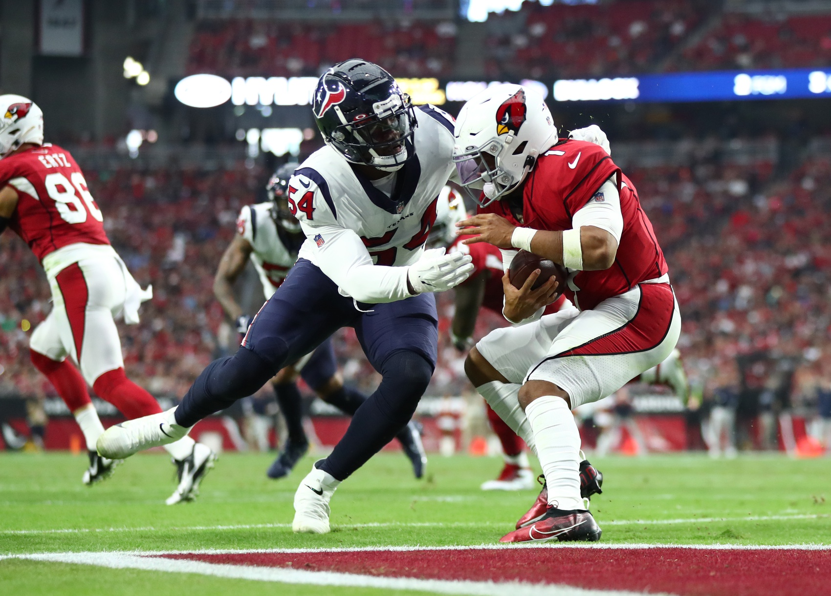 Jacob Martin brings down Ryan Tannehill for first sack as a Bronco