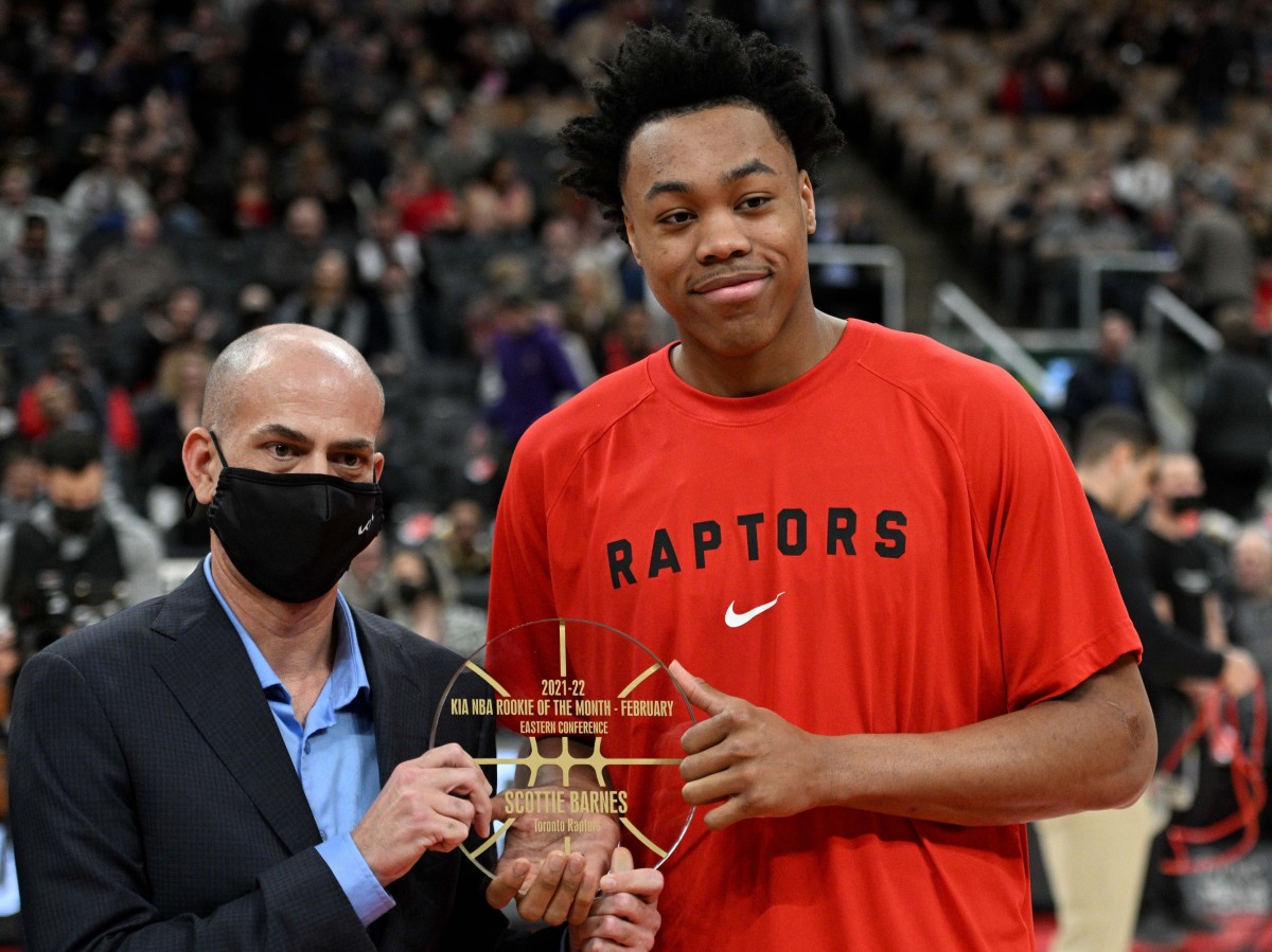 Toronto Raptors forward Scottie Barnes (4) is presented with the NBA Rookie of the Month award before playing the Cleveland Cavaliers at Scotiabank Arena