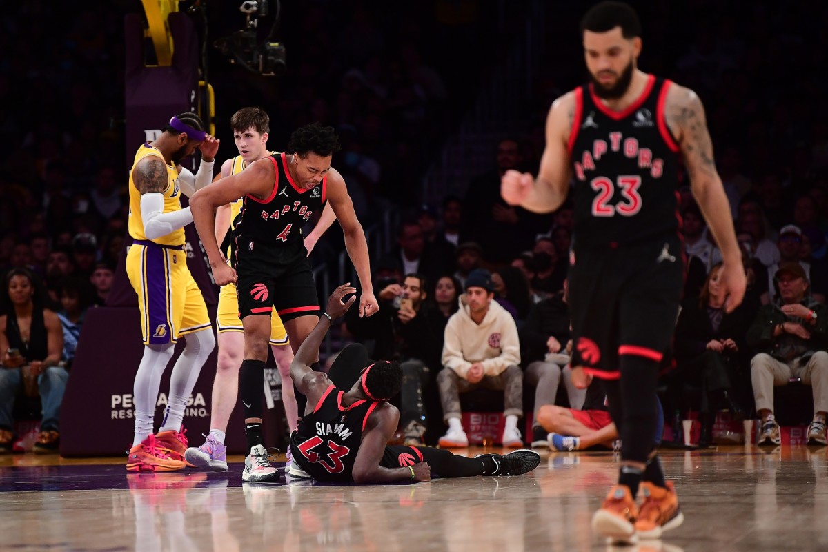 Toronto Raptors forward Scottie Barnes (4) and guard Fred VanVleet (23) reacts after forward Pascal Siakam (43) scores the basket and draws the foul against the Los Angeles Lakers during the second half at Crypto.com Arena