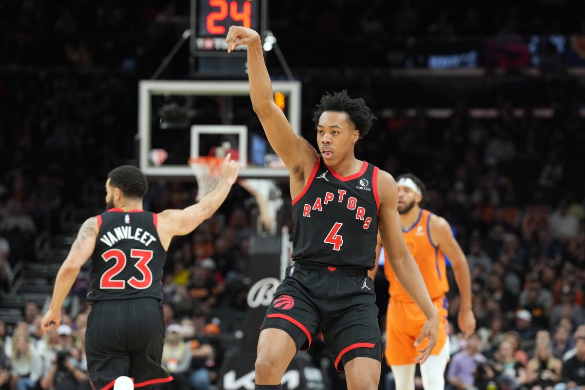 Toronto Raptors forward Scottie Barnes (4) celebrates a basket against the Phoenix Suns during the first half at Footprint Center