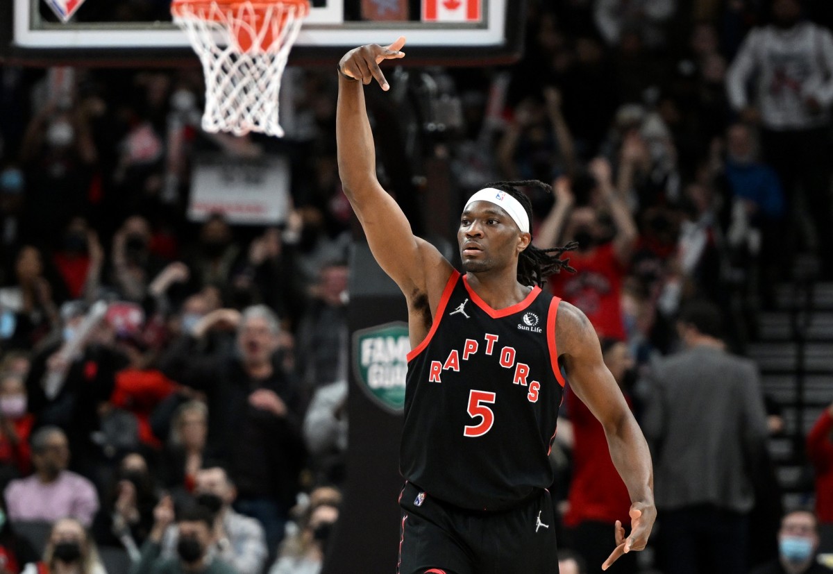 Toronto Raptors forward Precious Achiuwa (5) reacts after making a basket against the Detroit Pistons in the second half at Scotiabank Arena