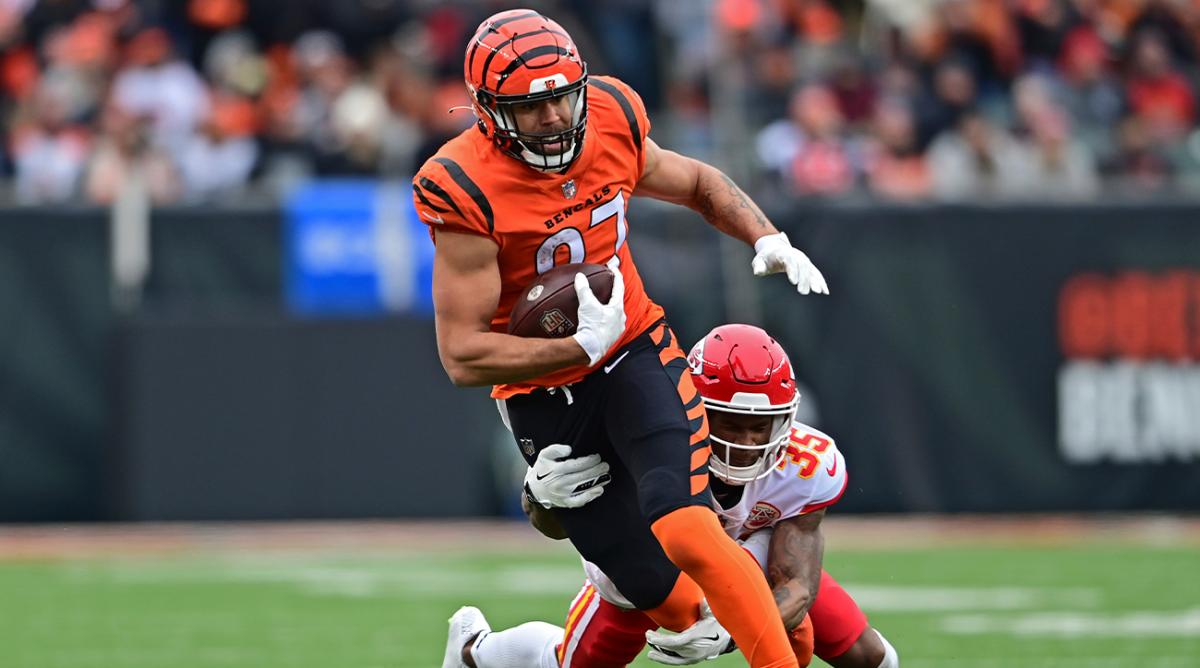 FILE -Cincinnati Bengals tight end C.J. Uzomah (87) is tackled by Kansas City Chiefs cornerback Charvarius Ward (35) during the first half of an NFL football game, Sunday, Jan. 2, 2022, in Cincinnati. C.J. Uzomah has heard all about the New York Jets’ woes at tight end the last several years. Tyler Conklin has, too. The Jets’ two newest additions at the position insist all that chatter — as well as the lack of catches and consistency — ends now.