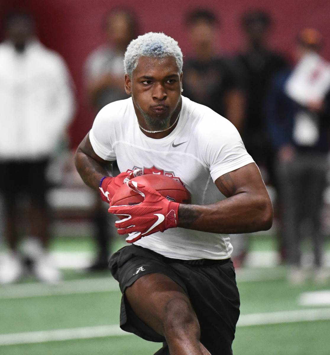 Slade Bolden #WO04 of Alabama runs a drill during the NFL Combine