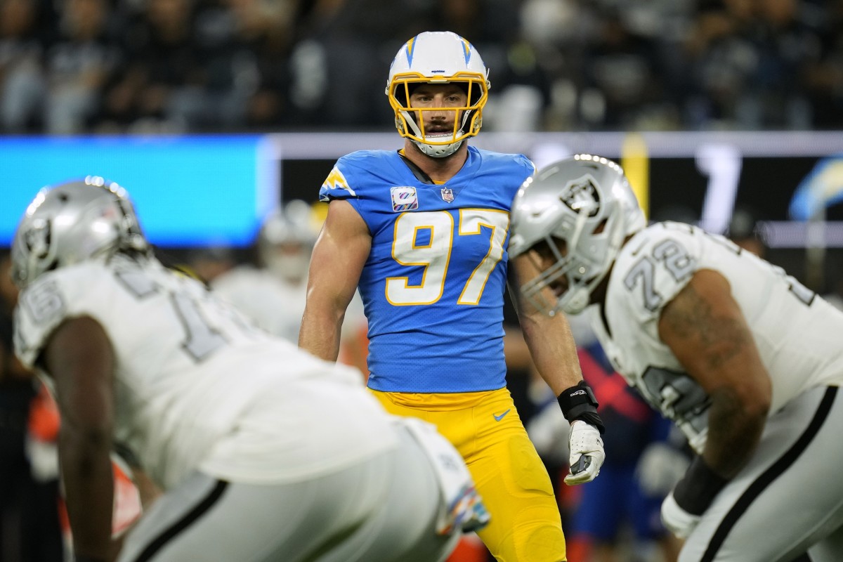 Los Angeles Chargers defensive end Joey Bosa (97) waits for the snap at the line of scrimmage against the Las Vegas Raiders during the first half at SoFi Stadium.