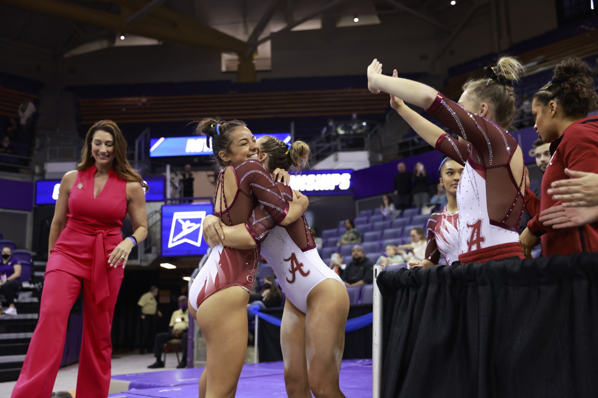 Ella Burgess and Lilly Hudson hug