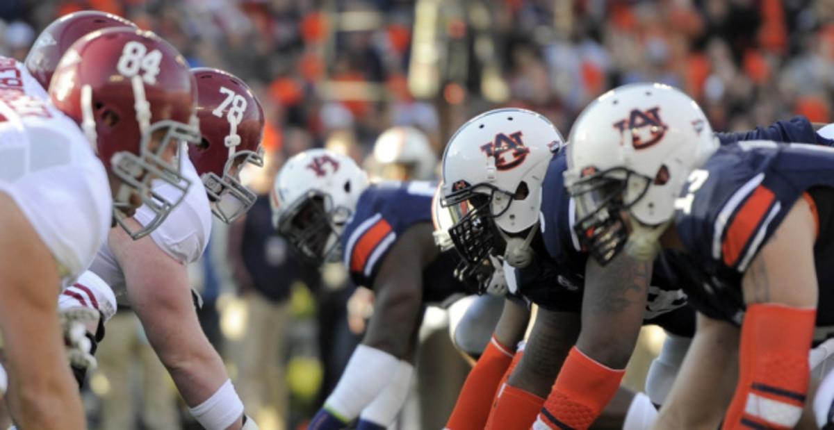 Scenes from the Iron Bowl college football rivalry game featuring Alabama vs. Auburn.