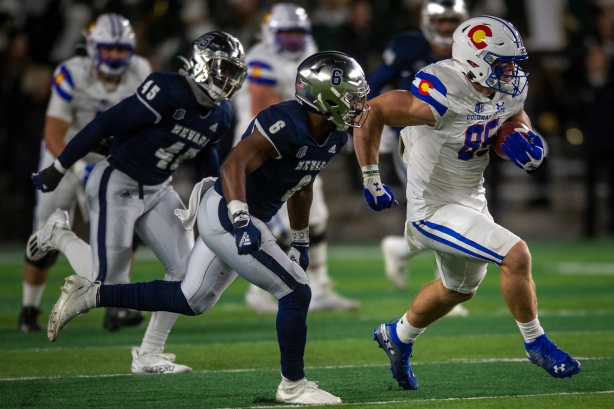 Colorado State senior tight end Trey McBride carries the football during a game against Nevada on Saturday, Nov. 27, 2021, at Canvas Stadium in Fort Collins.