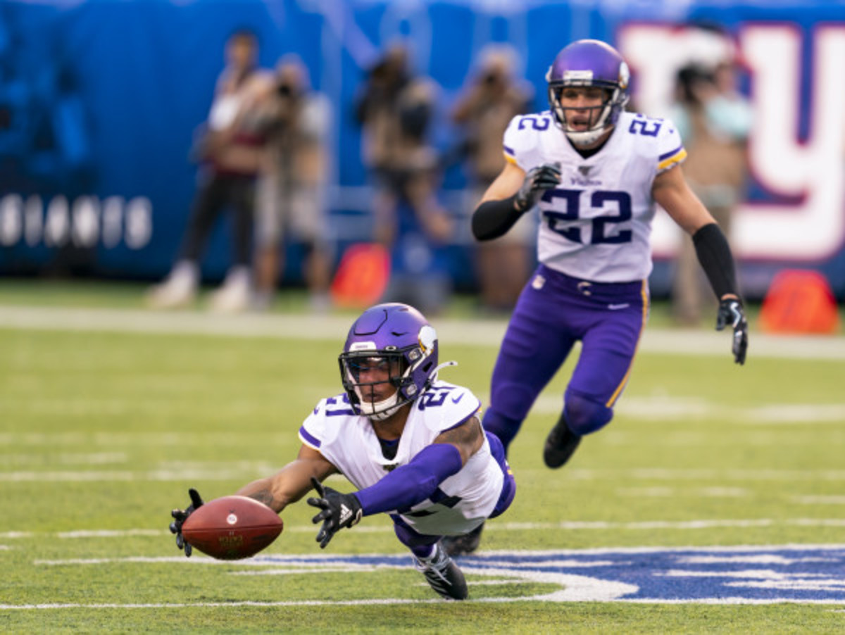 DETROIT, MI - OCTOBER 20: Detroit Lions RB Kerryon Johnson (33) readies  himself to stiff arm Minnesota Vikings S Anthony Harris (41) during NFL game  between Minnesota Vikings and Detroit Lions on