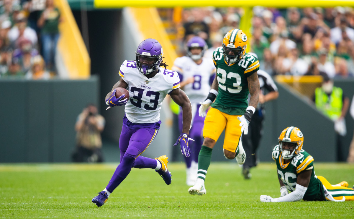 Vikings defeat Packers 28-22 behind four Cook touchdowns