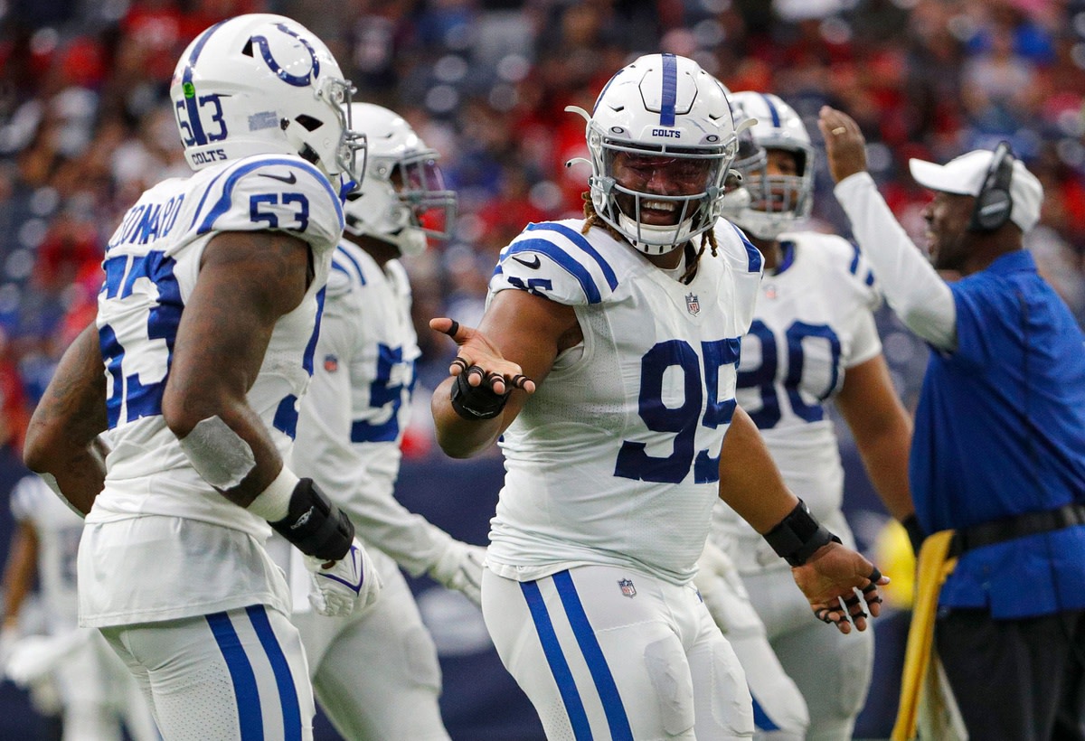 Indianapolis Colts defensive tackle Taylor Stallworth (95) linebacker Darius Leonard (53) celebrate the team's defensive success during the fourth quarter of the game Sunday, Dec. 5, 2021, at NRG Stadium in Houston. Indianapolis Colts Versus Houston Texans On Sunday Dec 5 2021 At Nrg Stadium In Houston Texas