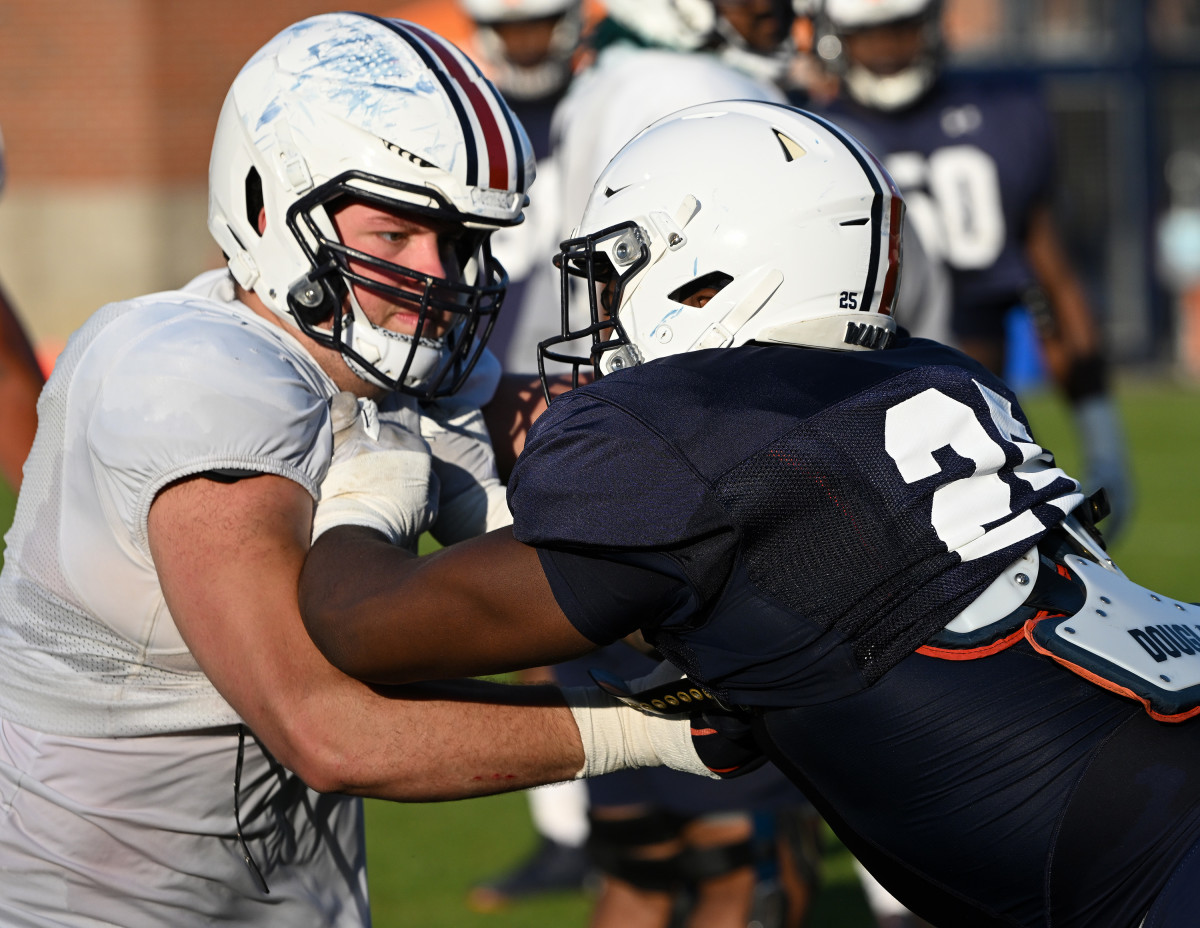 Tate Johnson (54) and Colby Wooden (25)Auburn FB practice on Monday. April 4, 2022 in Auburn, Ala.Todd Van Emst/AU Athletics