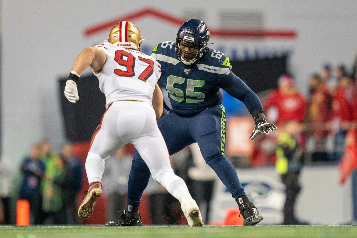 Atlanta Falcons guard Germain Ifedi (74) watches before a