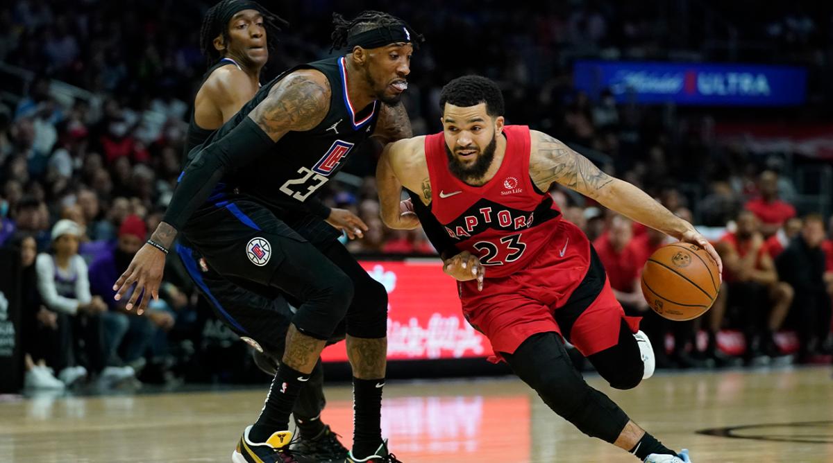 Los Angeles Clippers forward Robert Covington (23) defends against Toronto Raptors guard Fred VanVleet (23) during the second half of an NBA basketball game in Los Angeles, Wednesday, March 16, 2022.