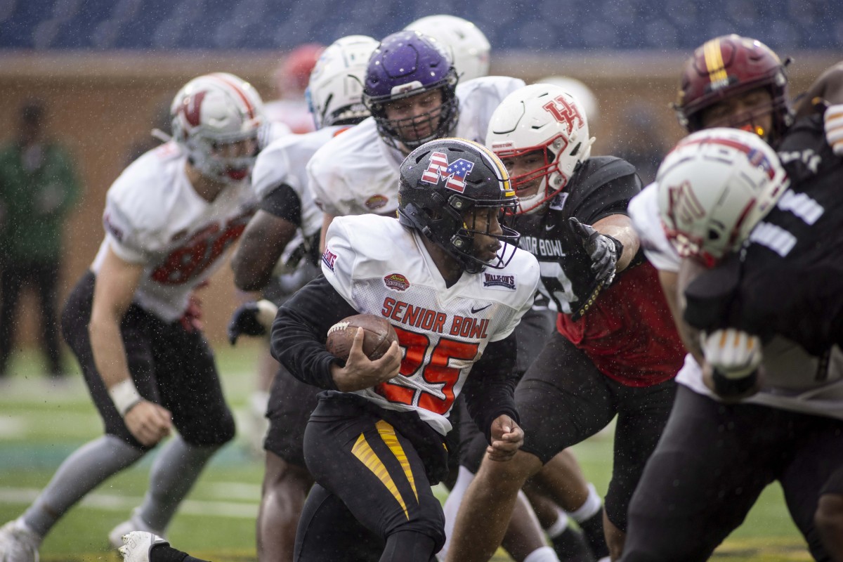 Feb 2, 2022; Mobile, AL, USA; National running back Tyler Badie of Missouri (25) runs the ball during National practice for the 2022 Senior Bowl in Mobile, AL, USA.