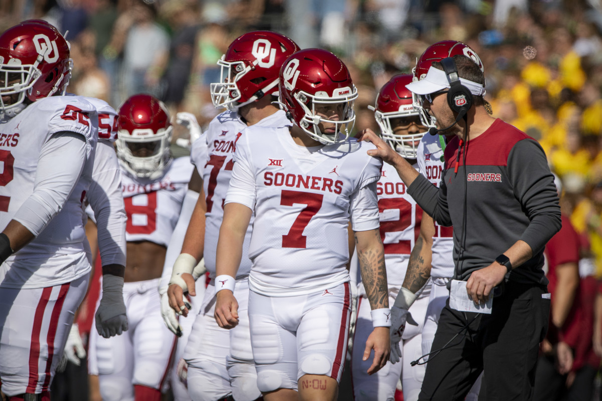 Spencer Rattler [left], Lincoln Riley [right]