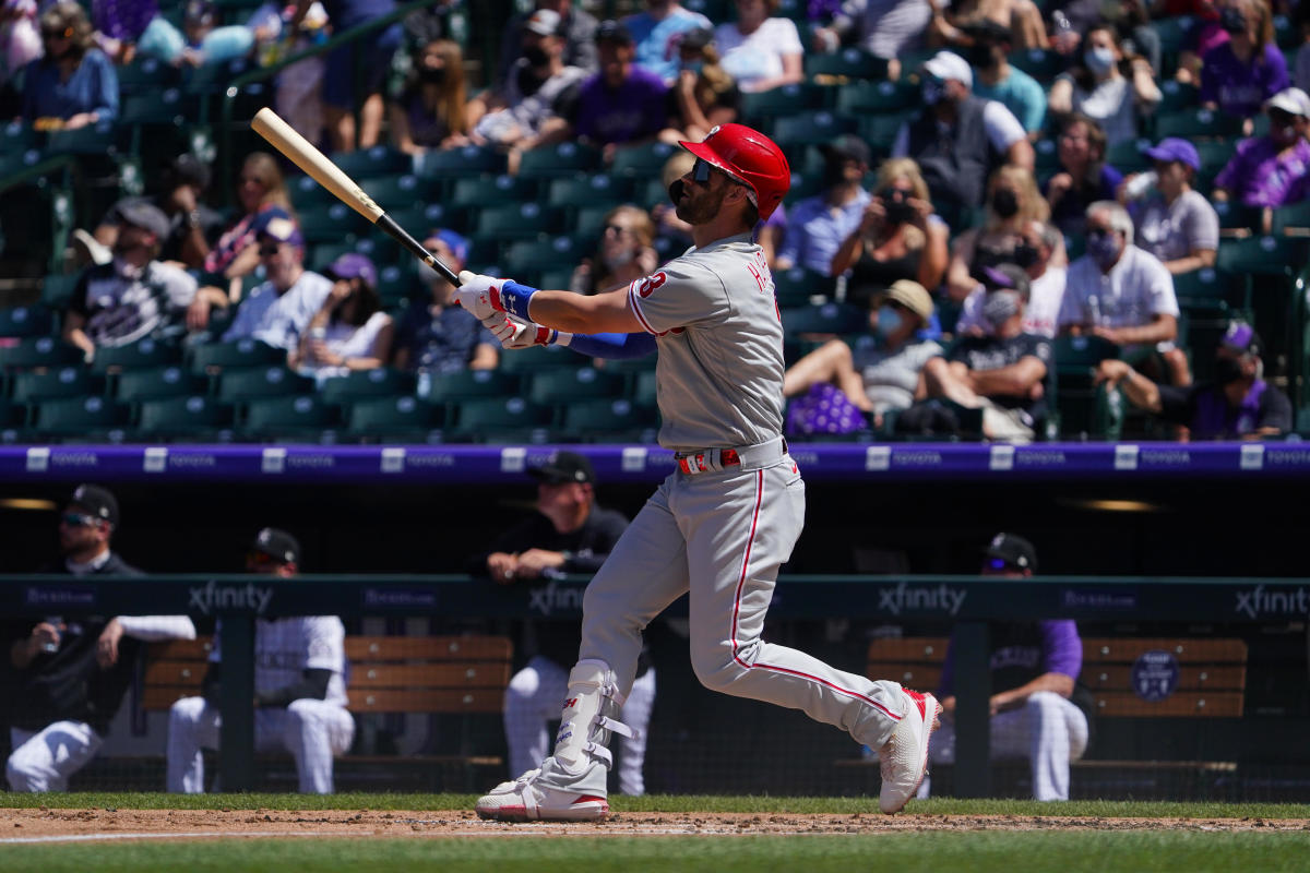 Bryce Harper hits his second solo home run of the game against the Colorado Rockies at Coors Field on April 25, 2021.