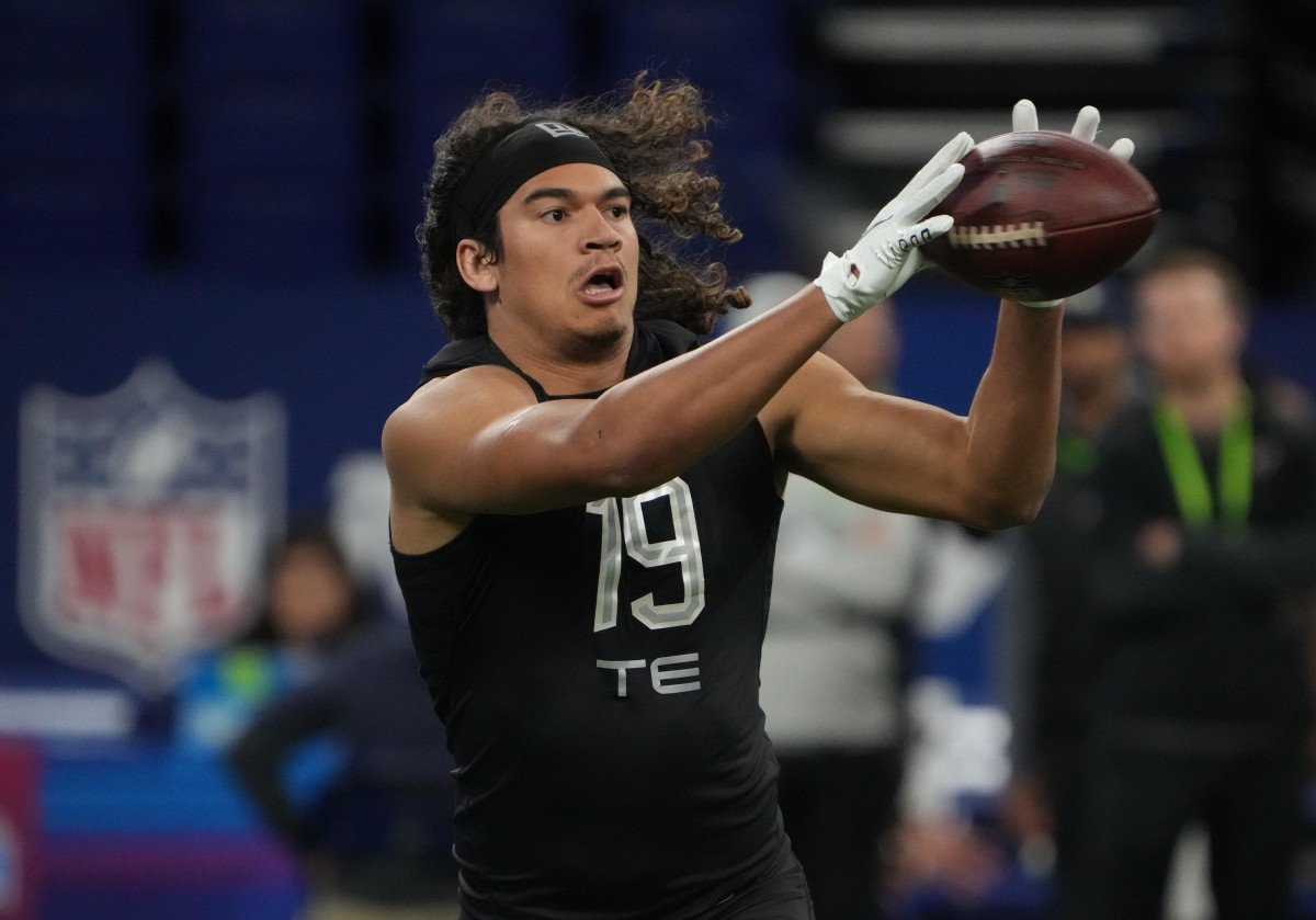 Mar 3, 2022; Indianapolis, IN, USA; Nevada tight end Cole Turner (TE19) goes through drills during the 2022 NFL Scouting Combine at Lucas Oil Stadium. Mandatory Credit: Kirby Lee-USA TODAY Sports