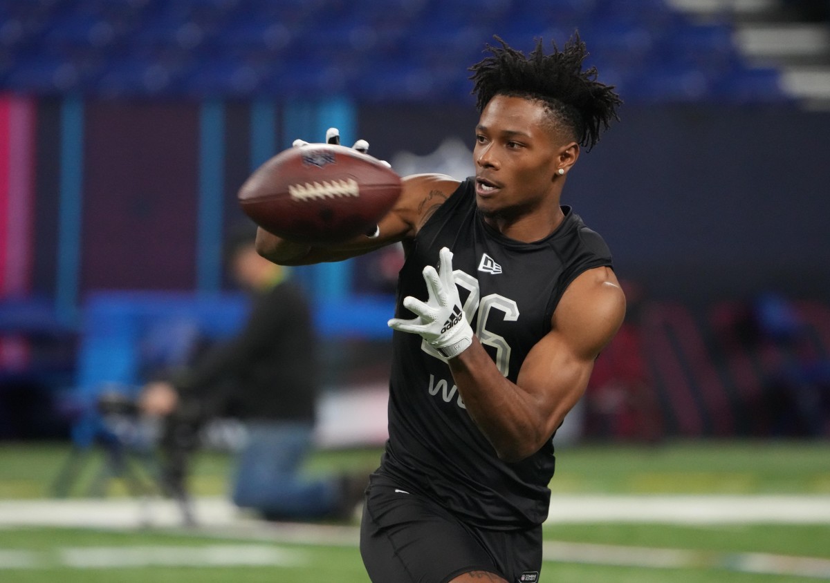 Mar 3, 2022; Indianapolis, IN, USA; Miami wide receiver Charleston Rambo (WO26) goes through drills during the 2022 NFL Scouting Combine at Lucas Oil Stadium. Mandatory Credit: Kirby Lee-USA TODAY Sports