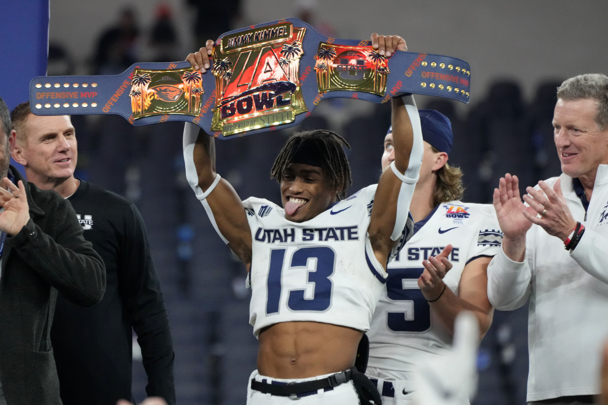 Utah State Aggies wide receiver Deven Thompkins (13) celebrates after the 2021 LA Bowl against the Oregon State Beavers at SoFi Stadium.