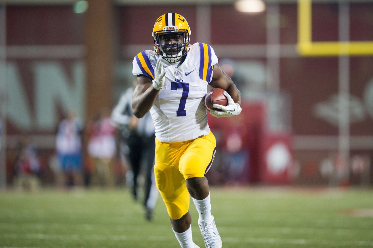 Nov 12, 2016; Fayetteville, AR, USA; LSU Tigers running back Leonard Fournette (7) runs during the first quarter of the game against the Arkansas Razorbacks at Donald W. Reynolds Razorback Stadium. Mandatory Credit: Brett Rojo-USA TODAY Sports