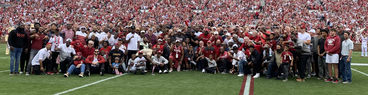 Brent Venables (center) and some of the 250 Sooner lettermen who came to the spring game.