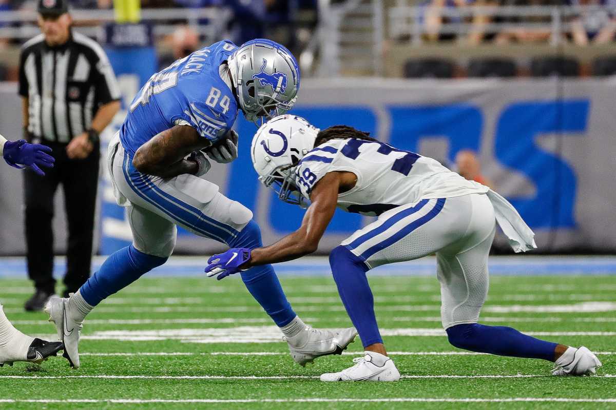 Detroit Lions tight end Alize Mack (84) is tackled by Indianapolis Colts cornerback Marvell Tell III (39) during the second half of a preseason game at Ford Field in Detroit on Friday, Aug. 27, 2021.