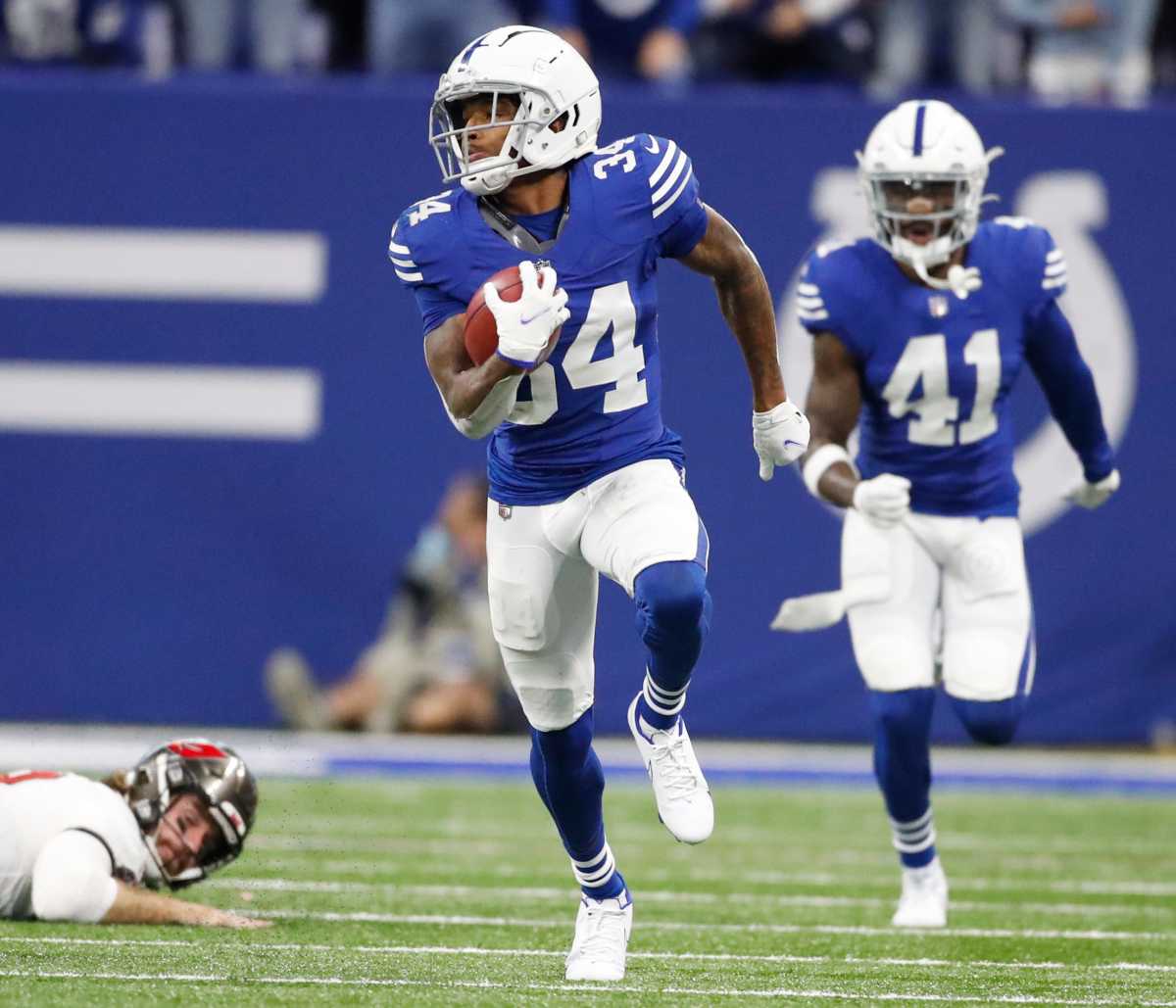 Indianapolis Colts cornerback Isaiah Rodgers (34) brings a little excitement with a long fourth quarter kickoff return to give his team a late chance Sunday, Nov. 28, 2021, during a game against the Tampa Bay Buccaneers at Lucas Oil Stadium in Indianapolis. Tampa Bay won 38-31.