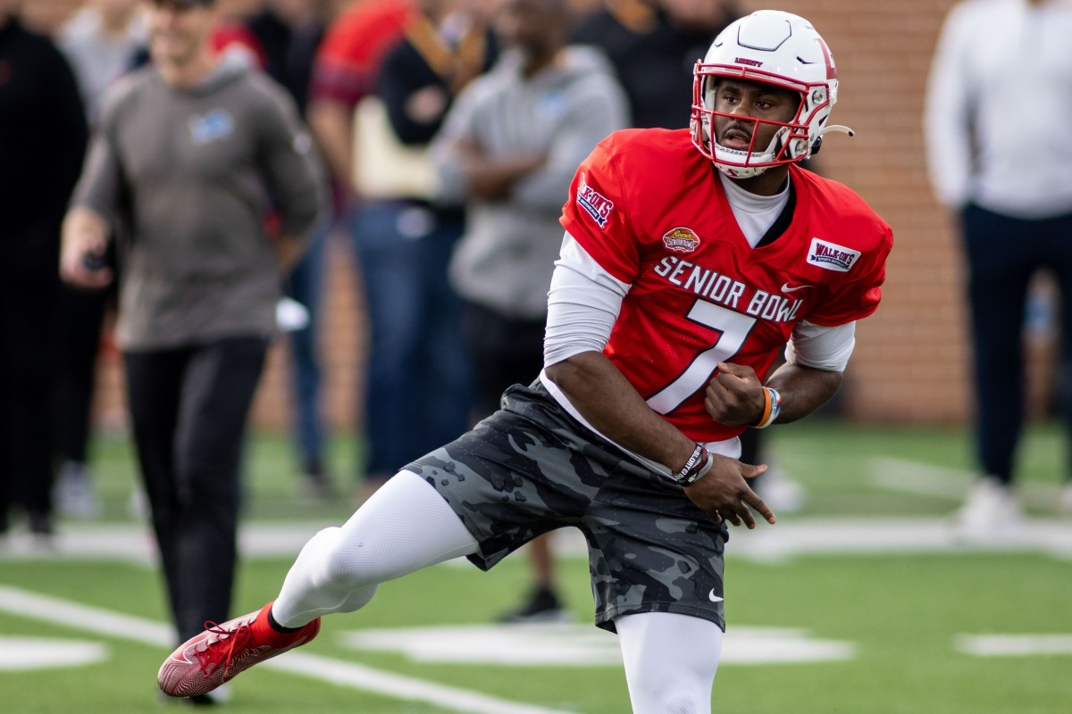 American quarterback Malik Willis of Liberty (7) throws during American practice for the 2022 Senior Bowl at Hancock Whitney Stadium.