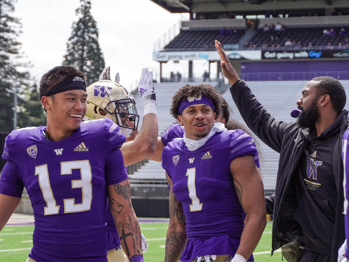 Kam Fabiculanan and Jordan Perryman enjoy the closing scrimmage.