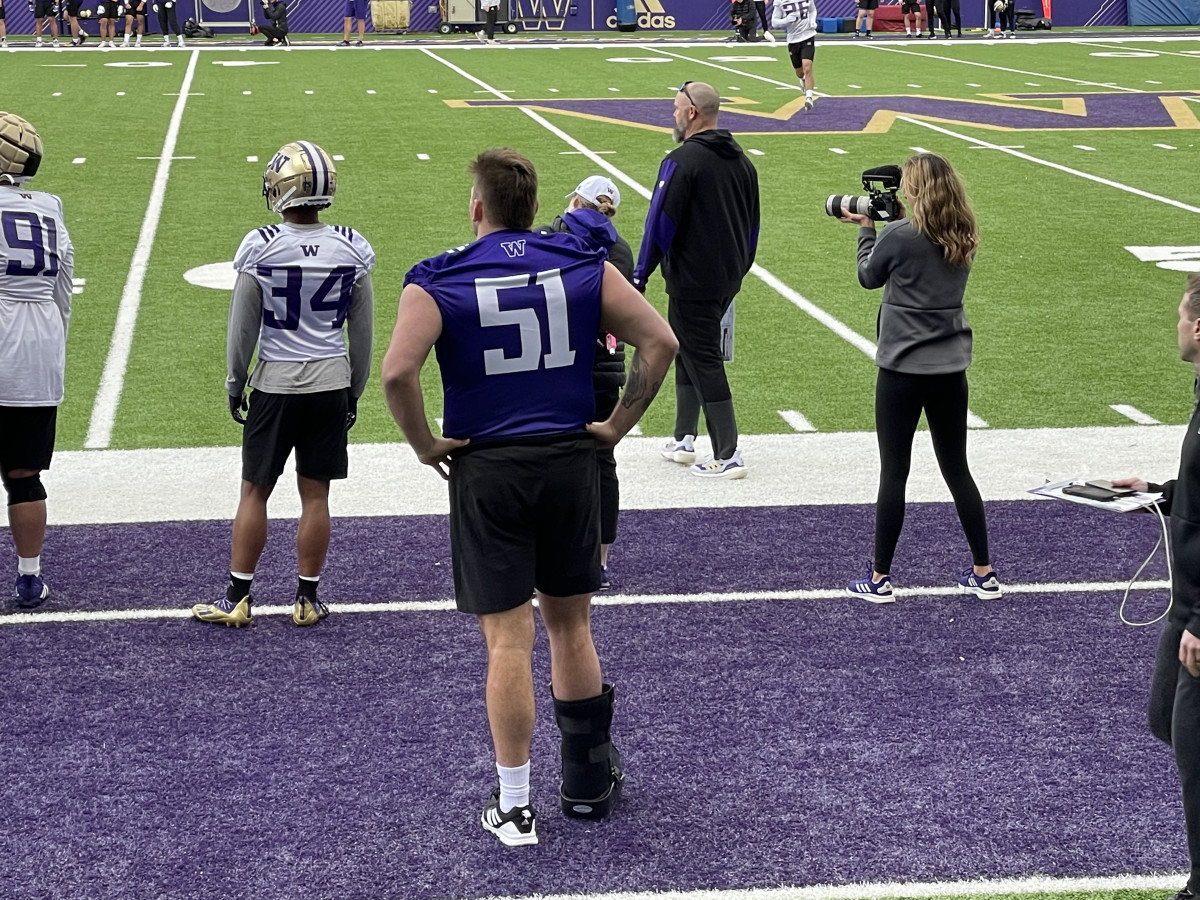 Jaxson Kirkland watches the first of 15 UW spring practices.