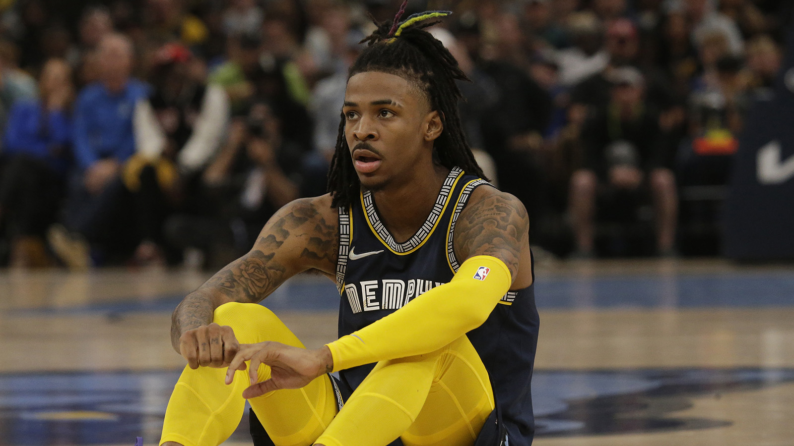 Ja Morant of the Memphis Grizzlies looks on against the Los