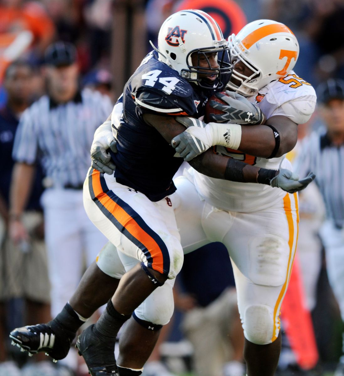 Tennessee defensive tackle Dan Williams (55) stops Auburn running back Ben Tate (44) Saturday at Jordan-Hare Stadium in Alabama in 2008. Auburn won the game 14-12, dropping Tennessee to 1-3 for the season. Utauburn15 Mp10392