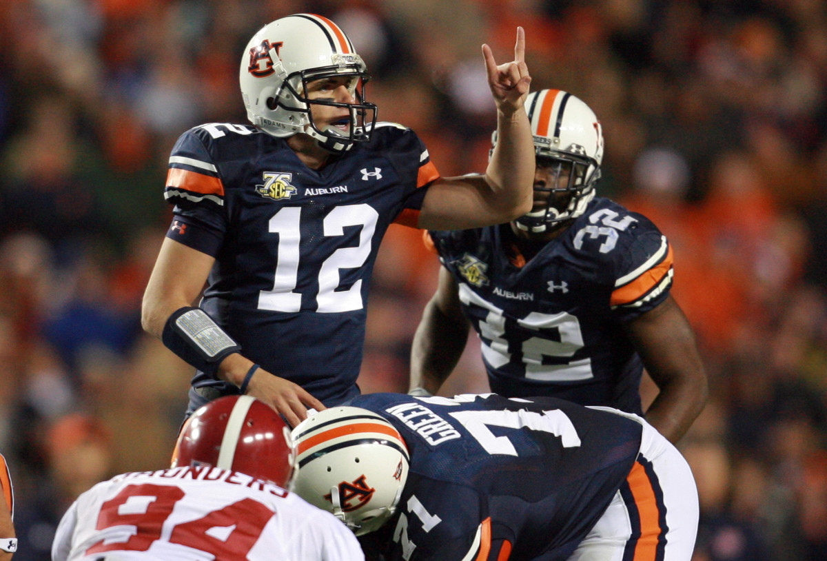 Nov 24, 2007; Auburn, AL, USA; Auburn Tigers quarterback (12) Brandon Cox signals to his team during the game against the Alabama Crimson Tide at Jordan-Hare Stadium. The Tigers defeated the Crimson Tide 17-10.