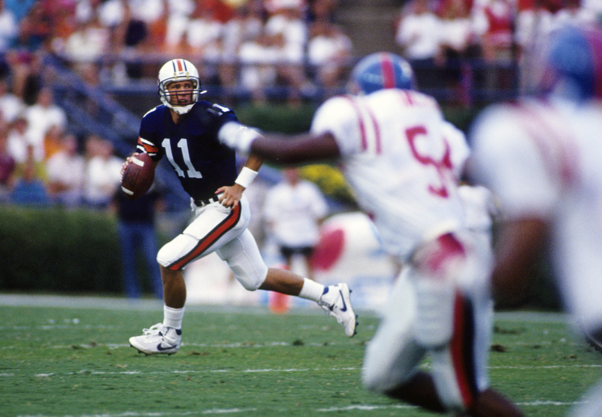 Oct 5, 1991; Auburn, AL, USA; FILE PHOTO; Auburn Tigers quarterback Stan White (11) runs with the ball against the Mississippi Rebels at Jordan Hare Stadium.