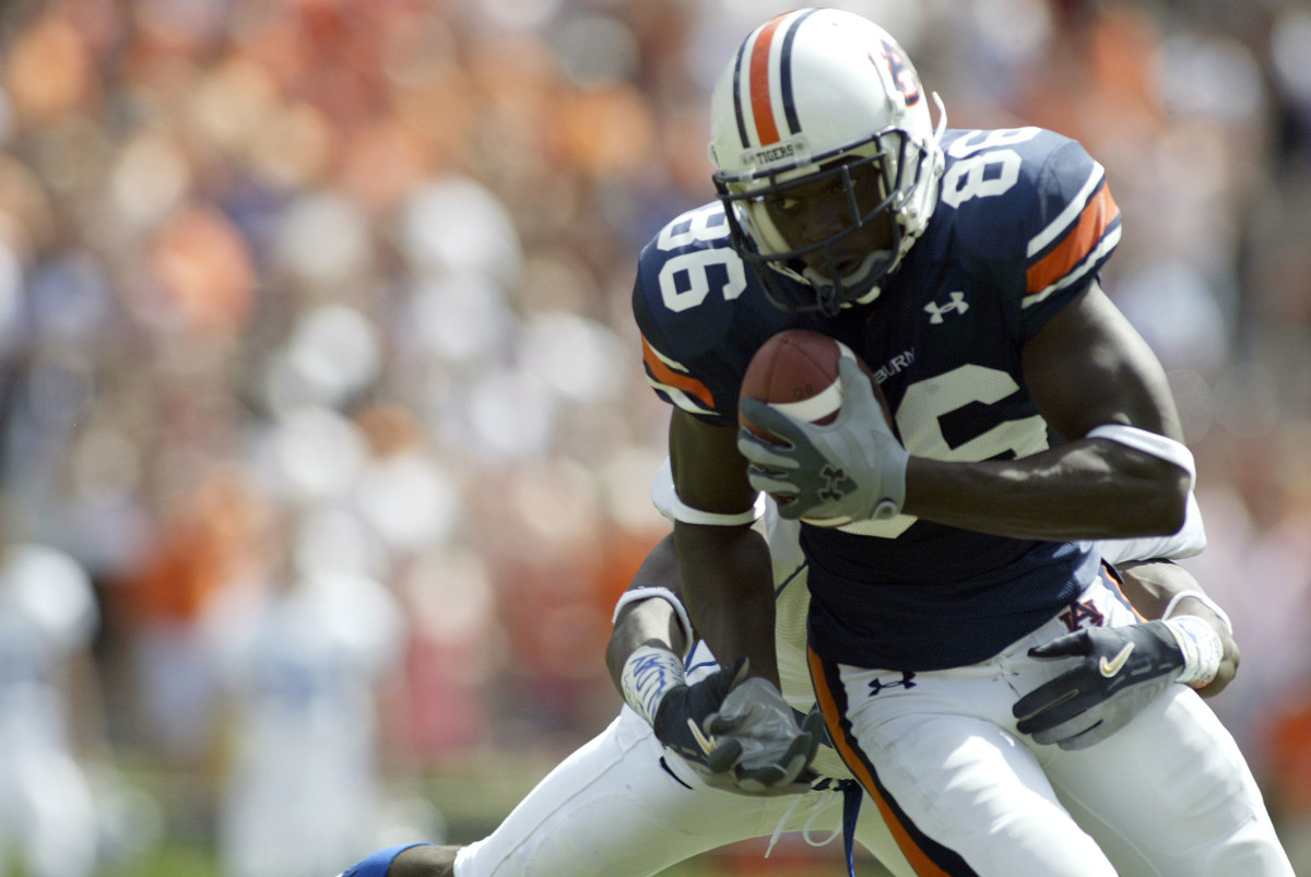 Sep 23, 2006; Auburn, AL, USA. Auburn Tigers wide receiver Courtney Taylor (86) escapes the grasp of a Buffalo Bulls defender at Jordan-Hare Stadium in Auburn. The Tigers beat the Bulls 38-7.