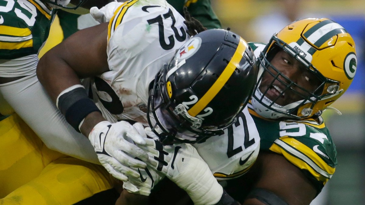 Green Bay Packers defensive tackle Devonte Wyatt (95) rushes during a NFL  preseason game against the New Orleans Saints Friday, Aug. 19, 2022, in Green  Bay, Wis. (AP Photo/Jeffrey Phelps Stock Photo - Alamy