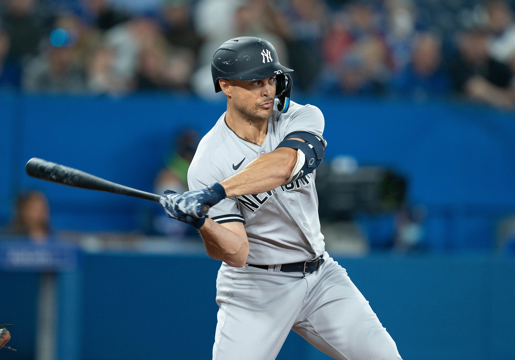 New York Yankees OF Giancarlo Stanton raking at plate while playing  outfield - Sports Illustrated NY Yankees News, Analysis and More