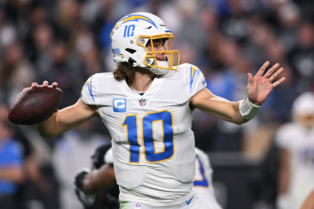 Los Angeles Chargers quarterback Justin Herbert (10) throws a pass against the Las Vegas Raiders during the second half at Allegiant Stadium.