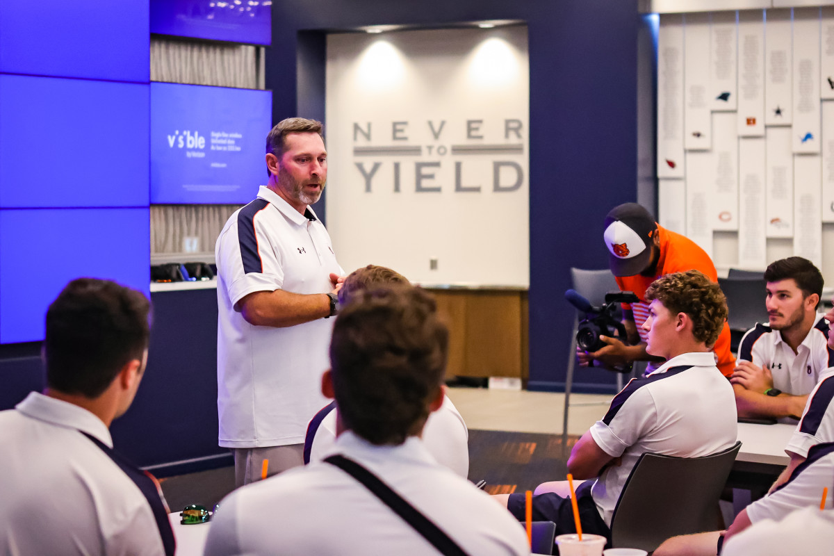 Butch Thompson and the Auburn baseball team waiting for the selection show