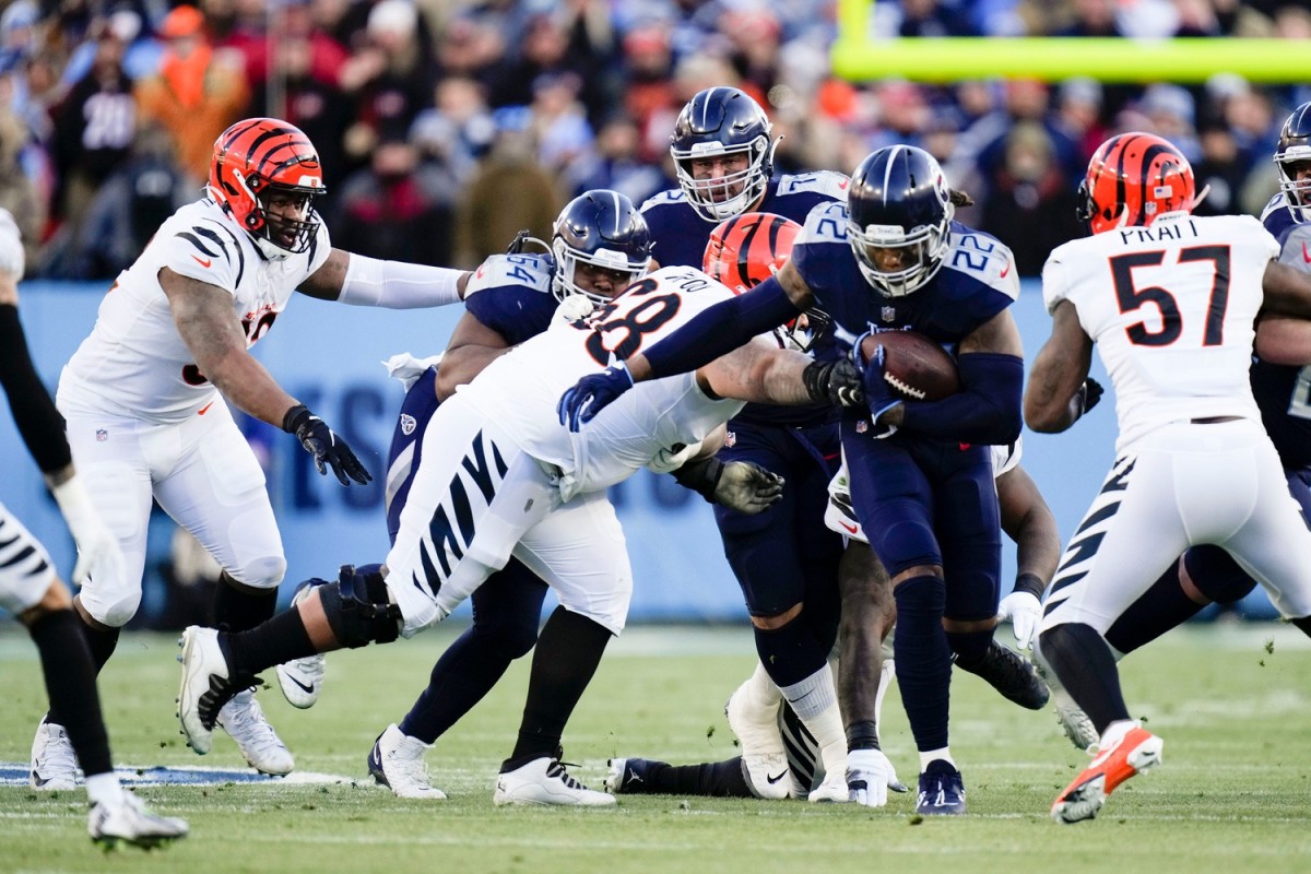 Tennessee Titans running back Derrick Henry (22) runs the ball during the first quarter of an AFC divisional playoff game at Nissan Stadium Saturday, Jan. 22, 2022 in Nashville, Tenn.