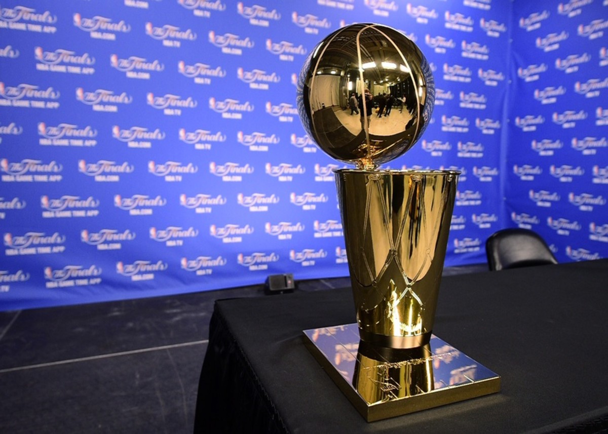 NBA History on X: By hoisting the Bill Russell trophy awarded to
