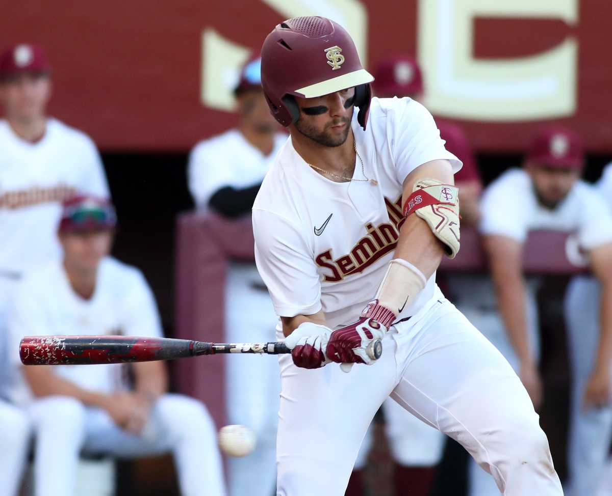 Florida State catcher Brock Mathis (8) swings against Jacksonville on Tuesday. Brock Mathis